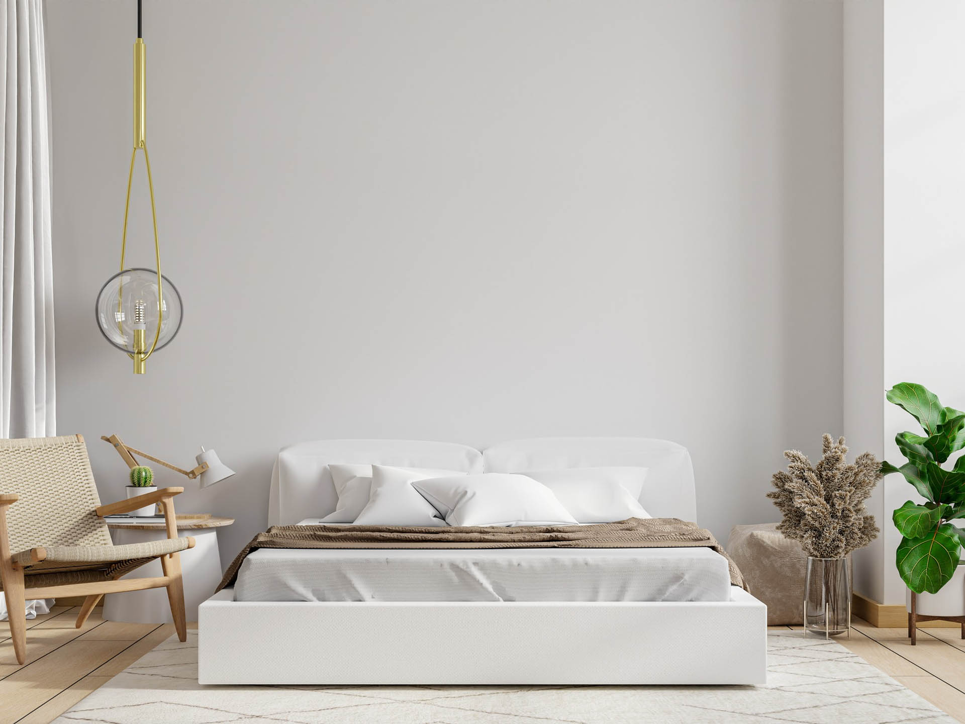 white bedroom with armchair wall 1
